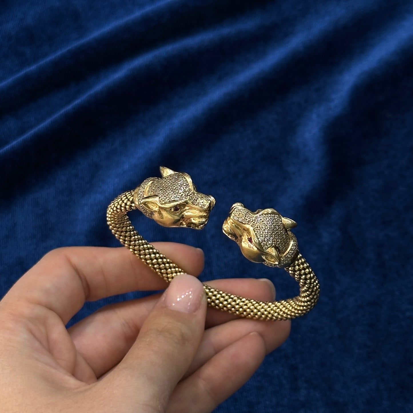 Bracciale pantera anni '60 in oro giallo, diamanti e rubini